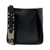Sac à bandoulière noir Stella McCartney avec logo perforé