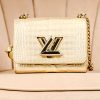 Louis Vuitton Twist PM Bag in Champagne Gold Crocodile