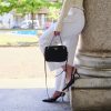 Bolso bandolera Prada en nailon acolchado negro